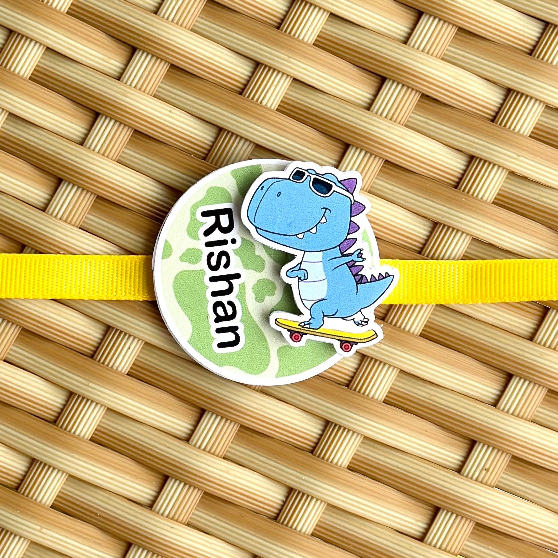 Double layered Rakhi - Dino on skates